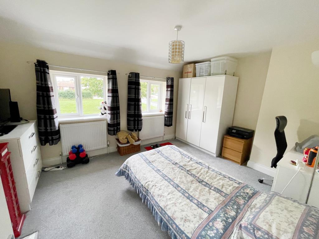Lot: 57 - THREE-BEDROOM TERRACE HOUSE FOR REPAIR IN POPULAR ESSEX VILLAGE - Bedroom 2 with window to front